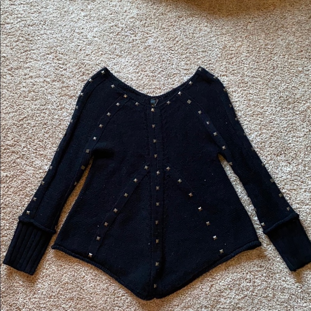 Black sweater with grommet details